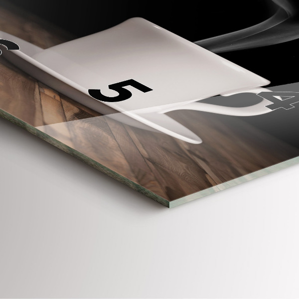 Square glass wall clock A cup of hot coffee