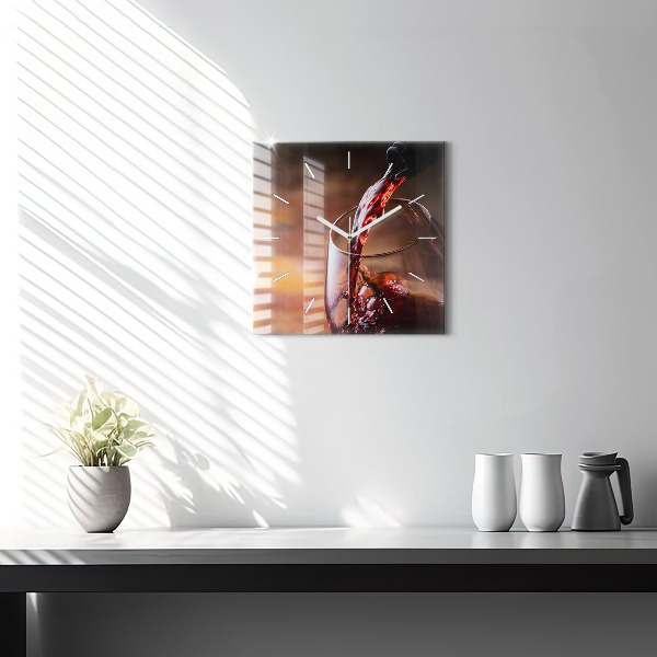 Square glass wall clock A glass of red wine