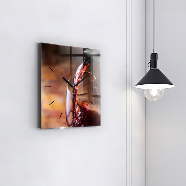 Square glass wall clock A glass of red wine