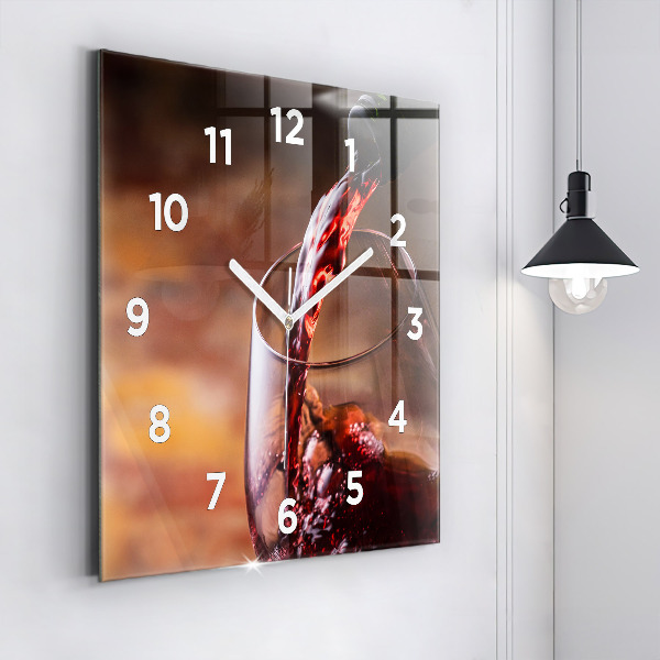 Square glass wall clock A glass of red wine