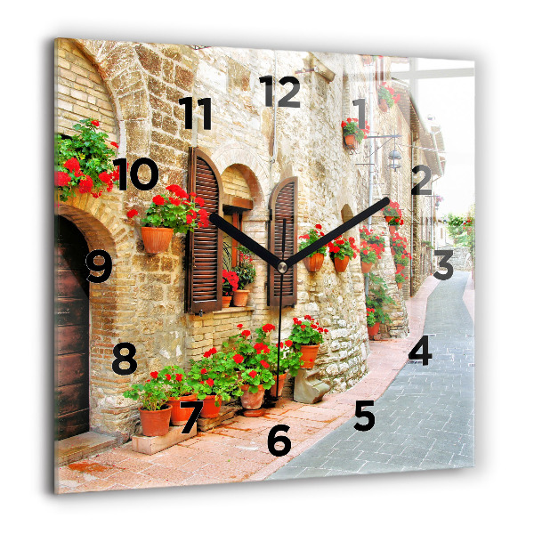 Square glass wall clock A picturesque street