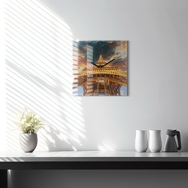 Square glass wall clock The Eiffel Tower against the clouds