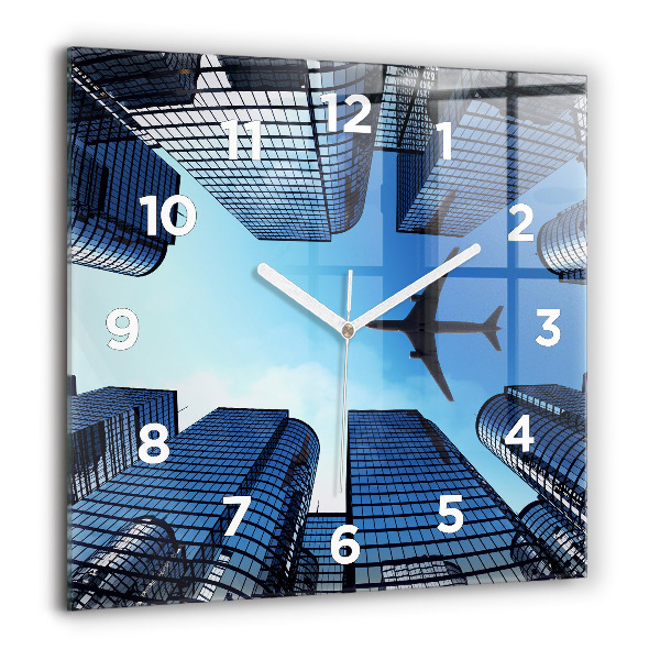 Square glass wall clock Airplane over buildings