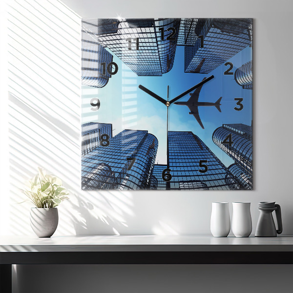 Square glass wall clock Airplane over buildings