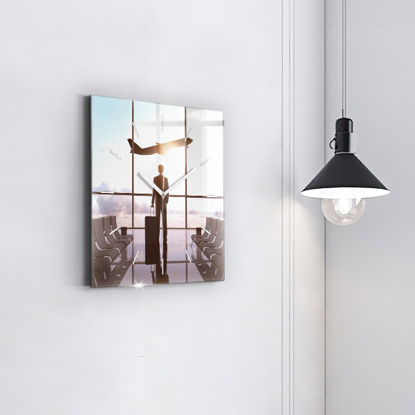 Square glass wall clock Man at the airport