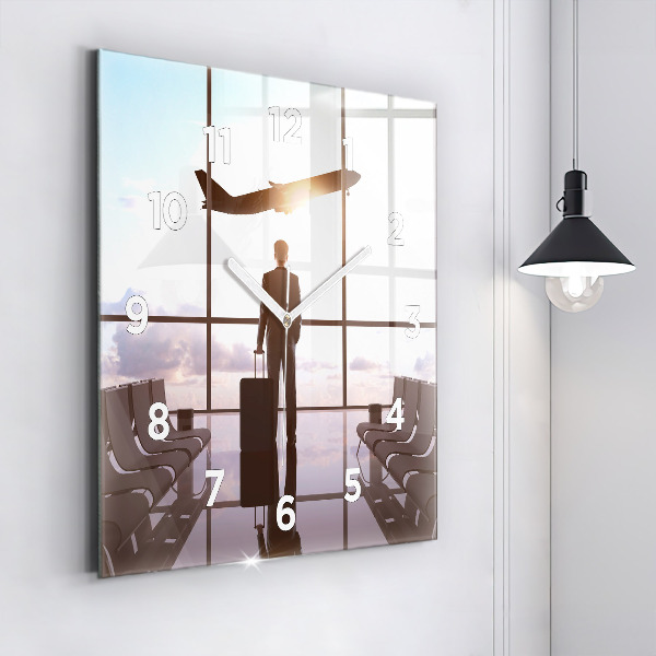 Square glass wall clock Man at the airport