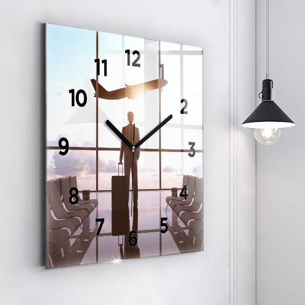 Square glass wall clock Man at the airport