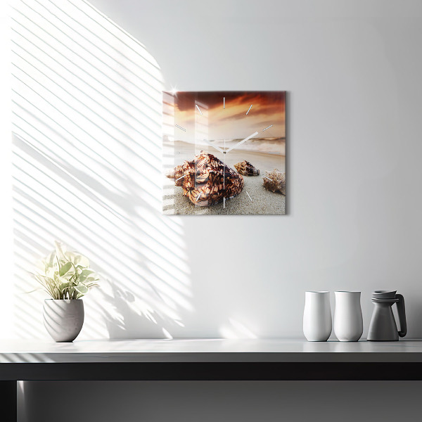 Square glass wall clock A shell on the beach