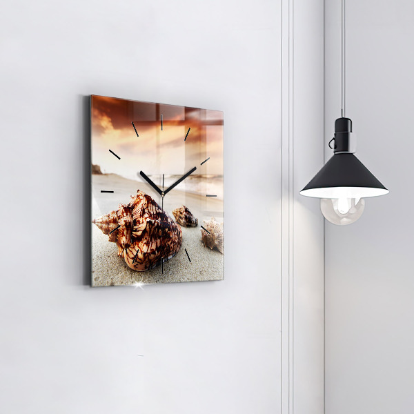 Square glass wall clock A shell on the beach