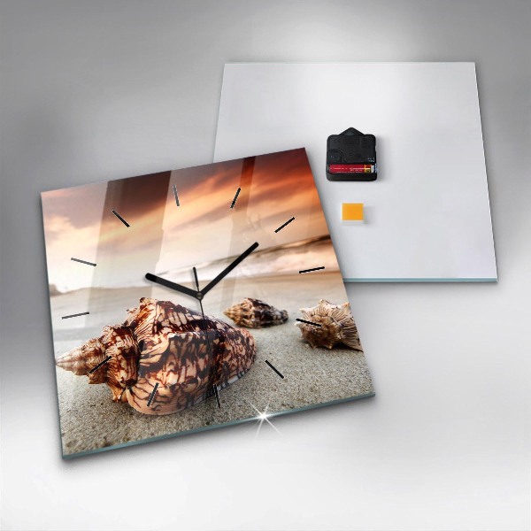 Square glass wall clock A shell on the beach