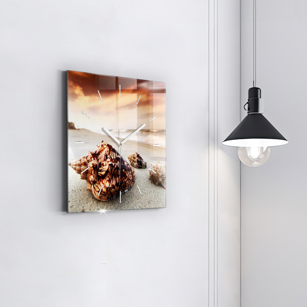 Square glass wall clock A shell on the beach