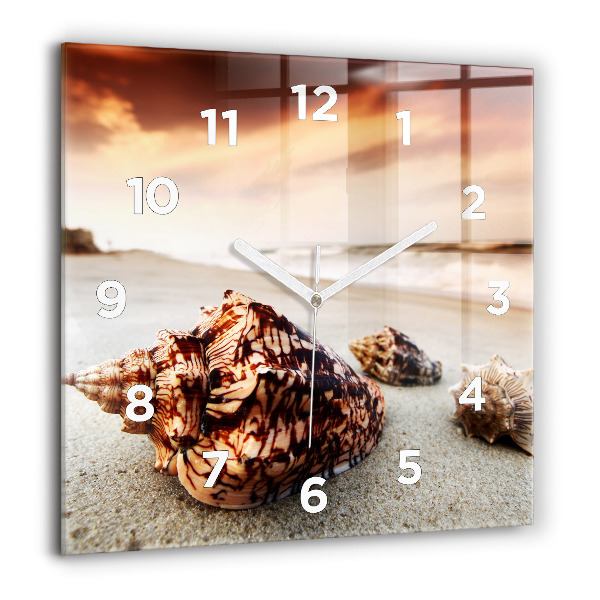 Square glass wall clock A shell on the beach