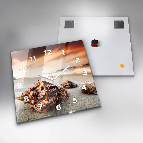 Square glass wall clock A shell on the beach