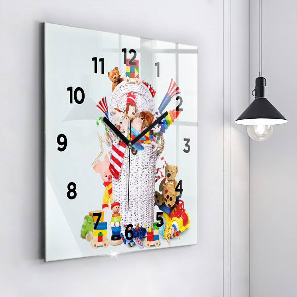 Square glass wall clock Wicker basket with toys