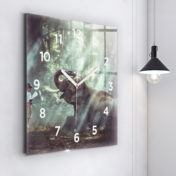 Square glass wall clock A boy is reading a book