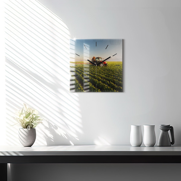 Square glass wall clock Tractor in a farm field