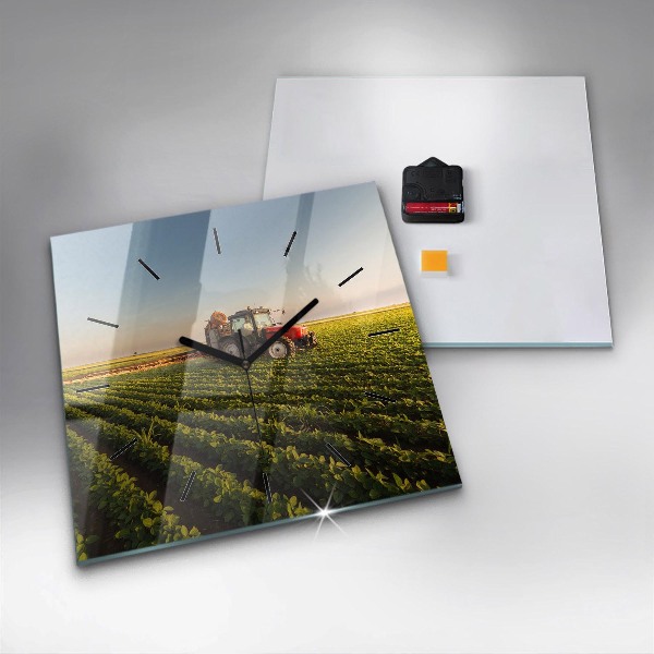 Square glass wall clock Tractor in a farm field