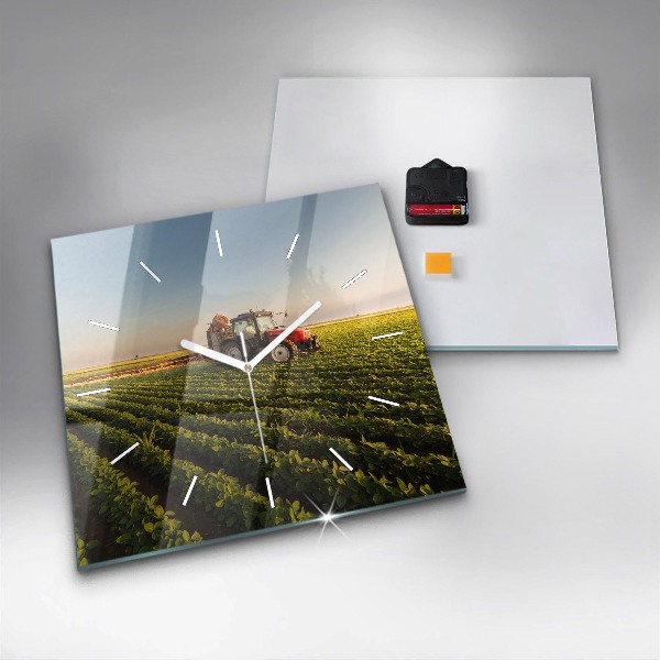 Square glass wall clock Tractor in a farm field