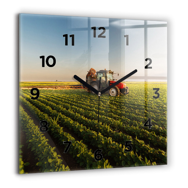 Square glass wall clock Tractor in a farm field