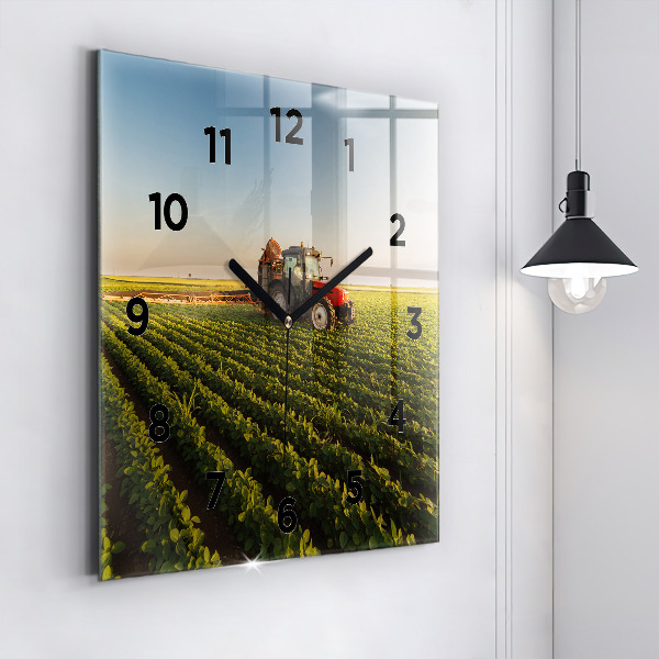 Square glass wall clock Tractor in a farm field