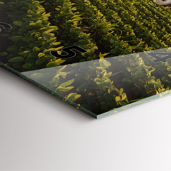 Square glass wall clock Tractor in a farm field