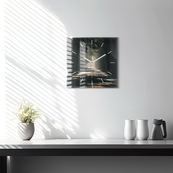 Square glass wall clock Forest road and streaks of sunlight