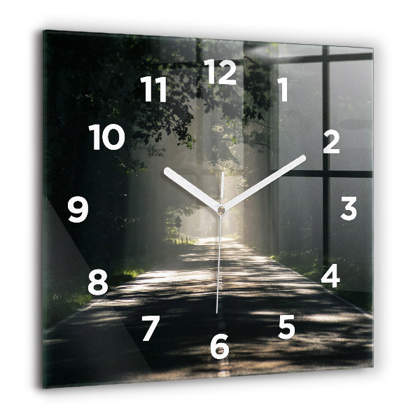 Square glass wall clock Forest road and streaks of sunlight