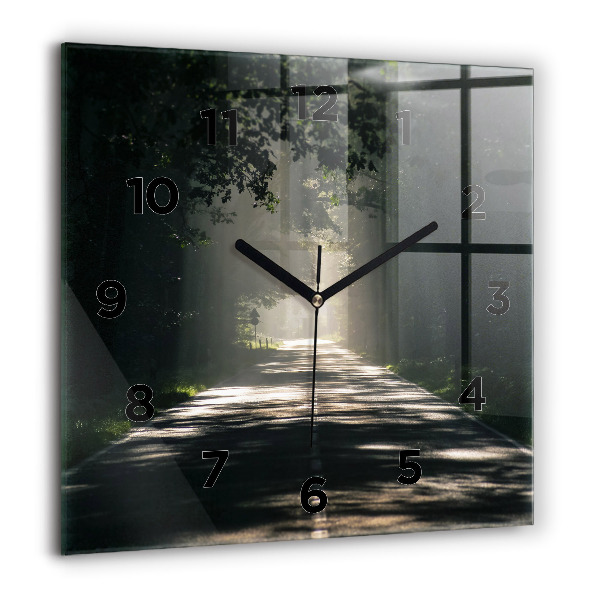 Square glass wall clock Forest road and streaks of sunlight