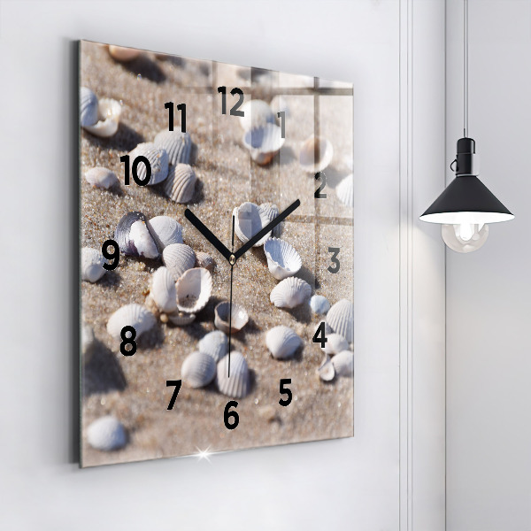 Square glass wall clock Seashells on the beach