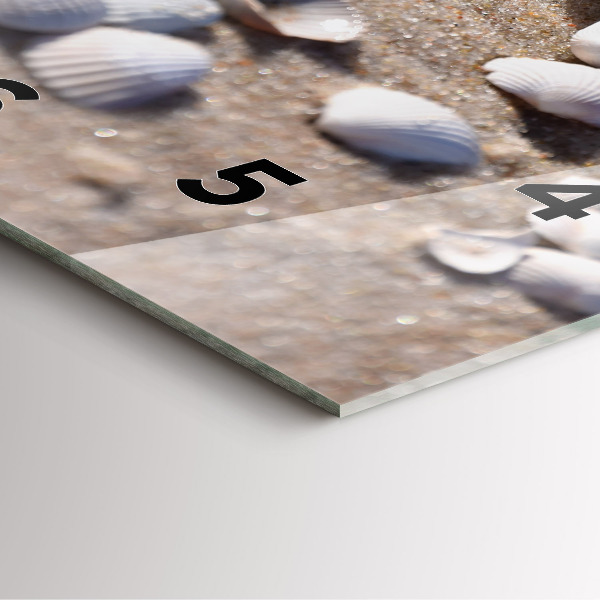 Square glass wall clock Seashells on the beach