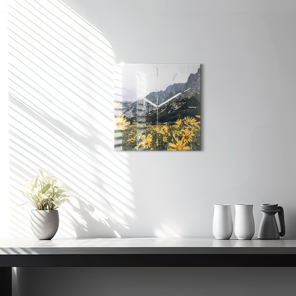 Square glass wall clock Meadow flowers in the mountains