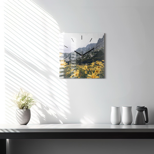 Square glass wall clock Meadow flowers in the mountains