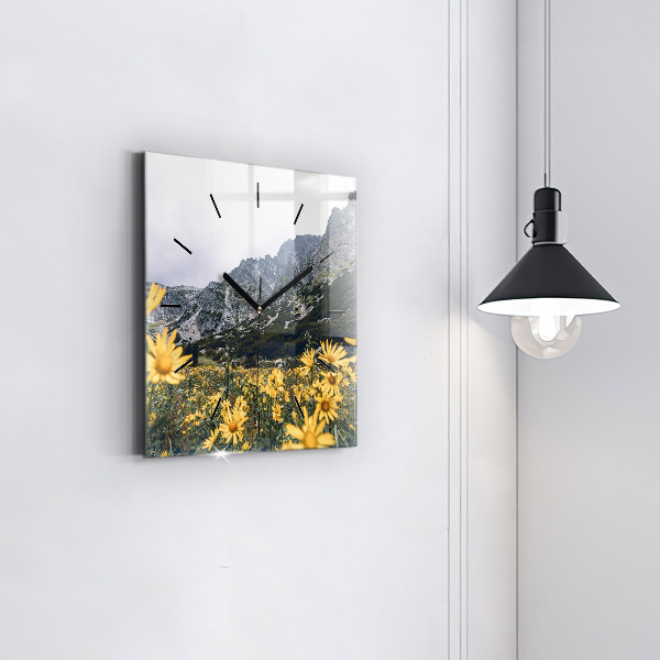 Square glass wall clock Meadow flowers in the mountains