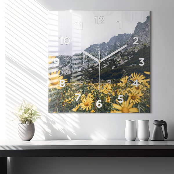 Square glass wall clock Meadow flowers in the mountains