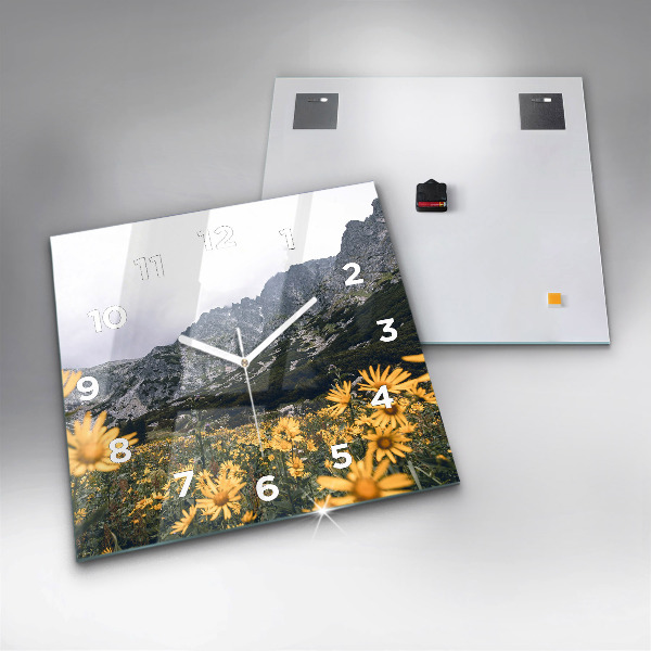 Square glass wall clock Meadow flowers in the mountains