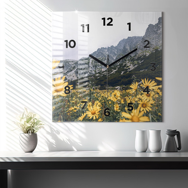 Square glass wall clock Meadow flowers in the mountains