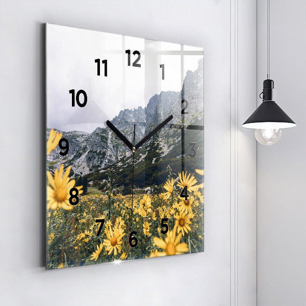 Square glass wall clock Meadow flowers in the mountains
