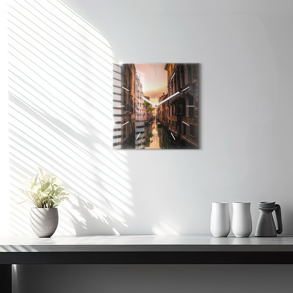 Square glass wall clock View of the canal in the city