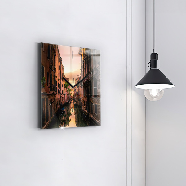Square glass wall clock View of the canal in the city