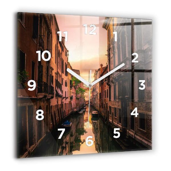 Square glass wall clock View of the canal in the city