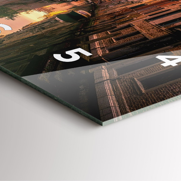 Square glass wall clock View of the canal in the city