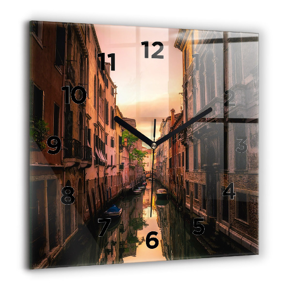 Square glass wall clock View of the canal in the city