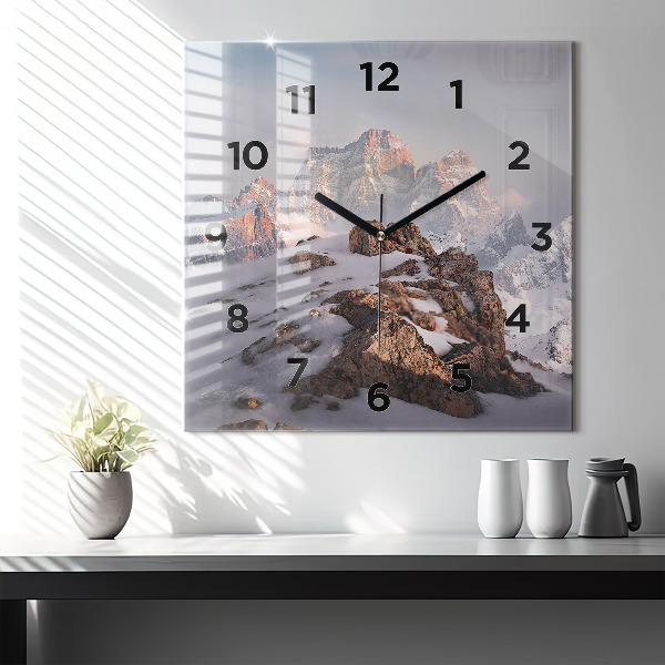 Square glass wall clock A mountain covered in snow