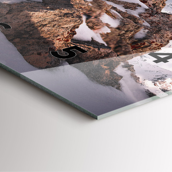 Square glass wall clock A mountain covered in snow