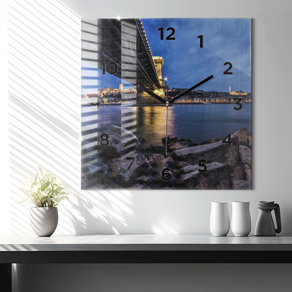 Square glass wall clock Rocky shore under the bridge