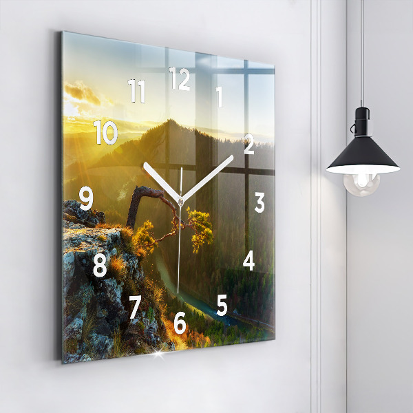 Square glass wall clock Sunset over the mountains