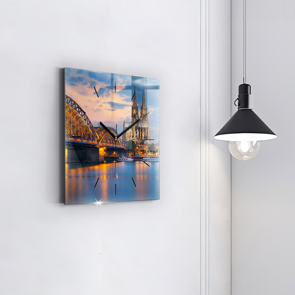 Square glass wall clock View of the town hall