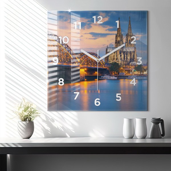 Square glass wall clock View of the town hall