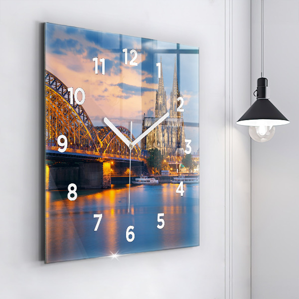 Square glass wall clock View of the town hall