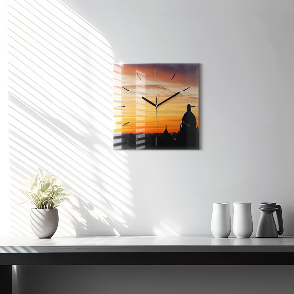 Square glass wall clock Building and sunset